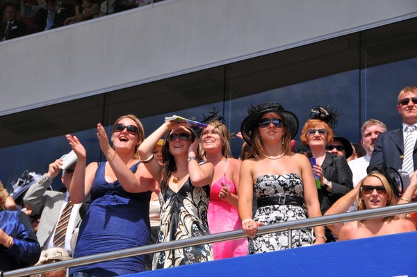 Enthusiastic Punters enjoying a beautiful day at the races.